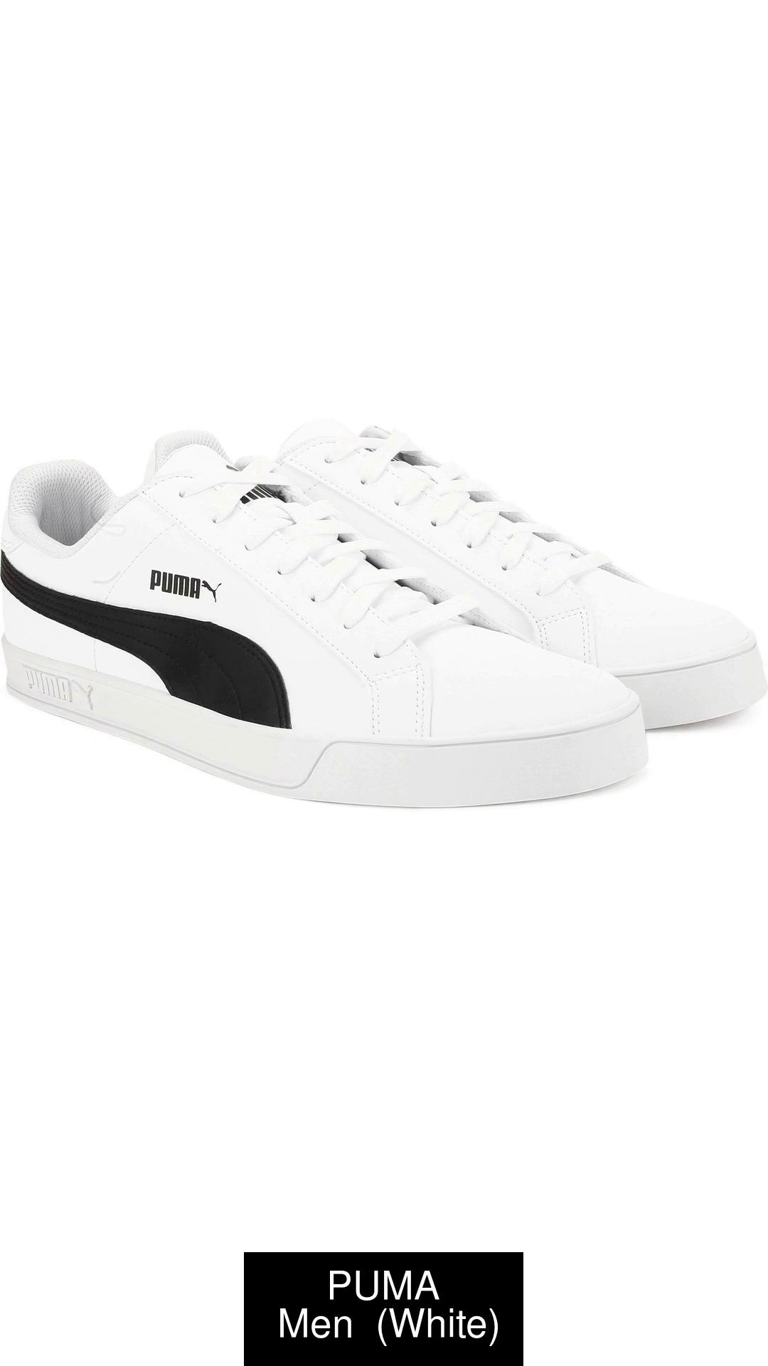 Puma white store black stripe