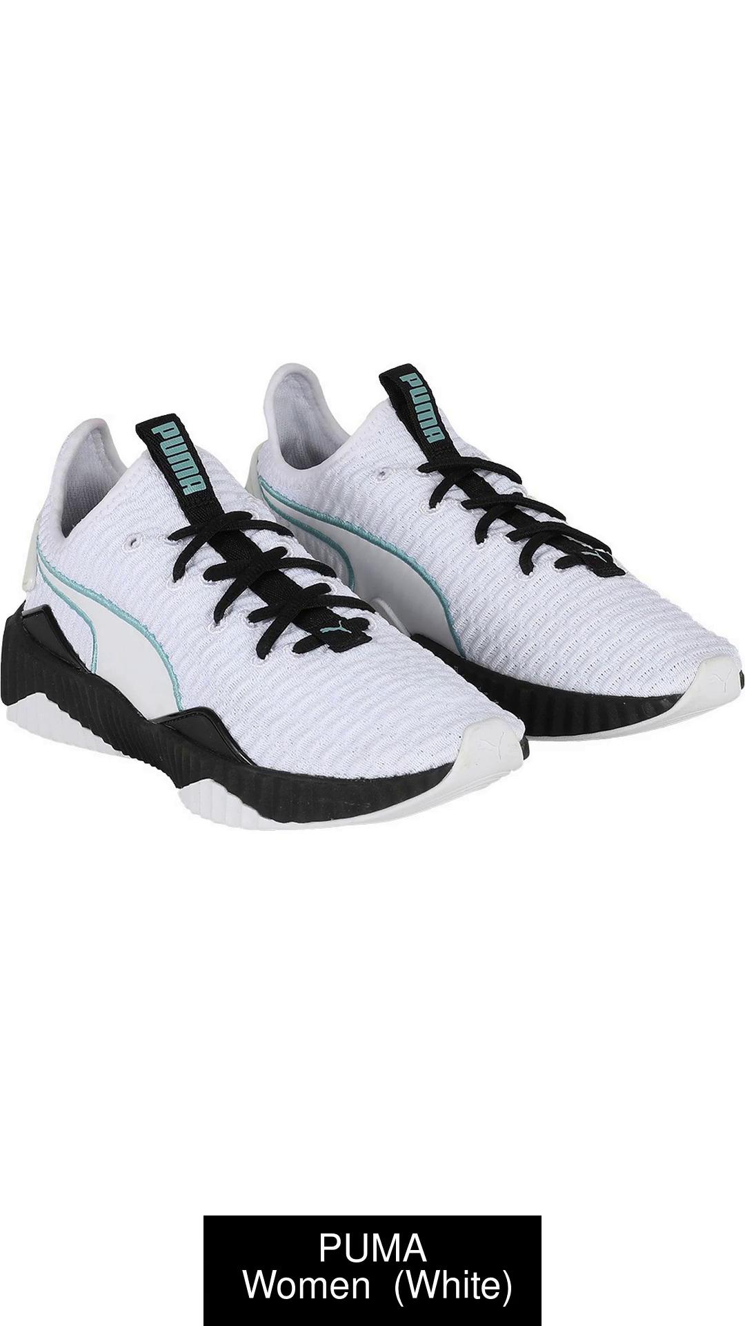 Puma defy clearance sneakers in white