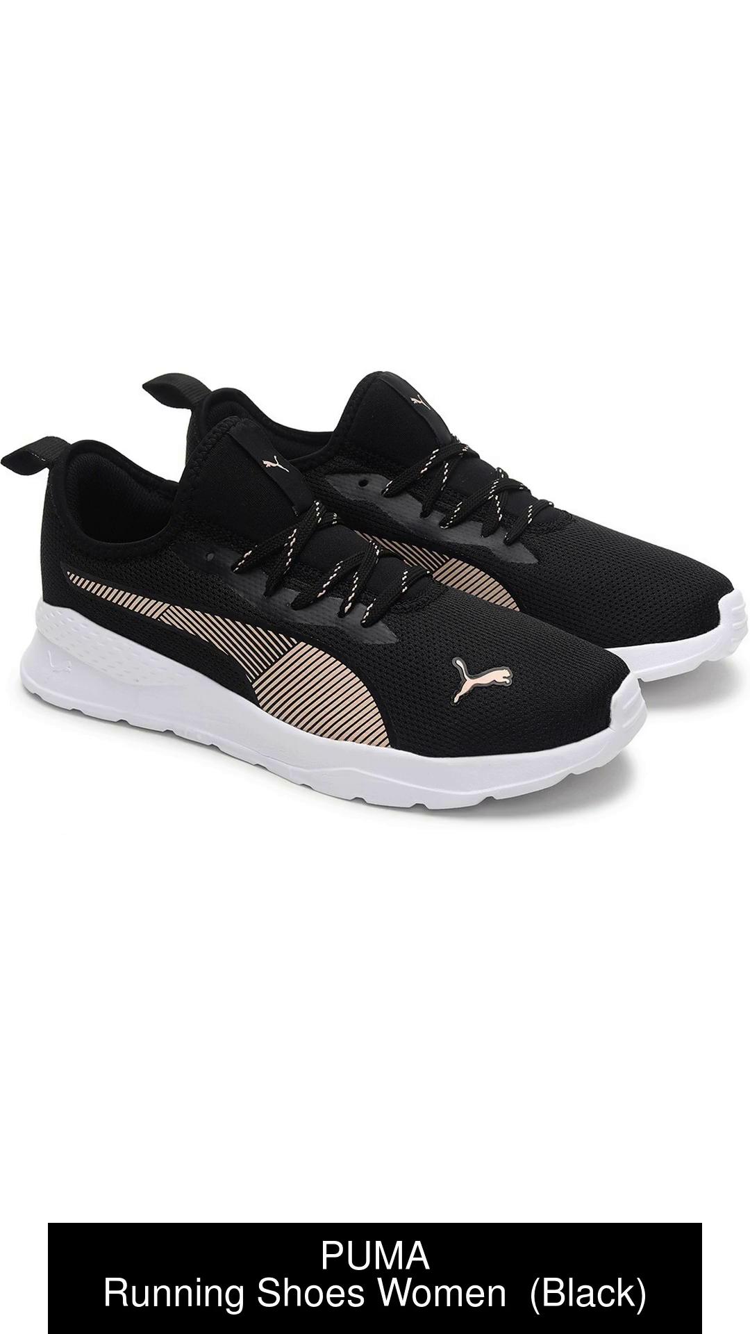 Puma black and on sale white shoes womens