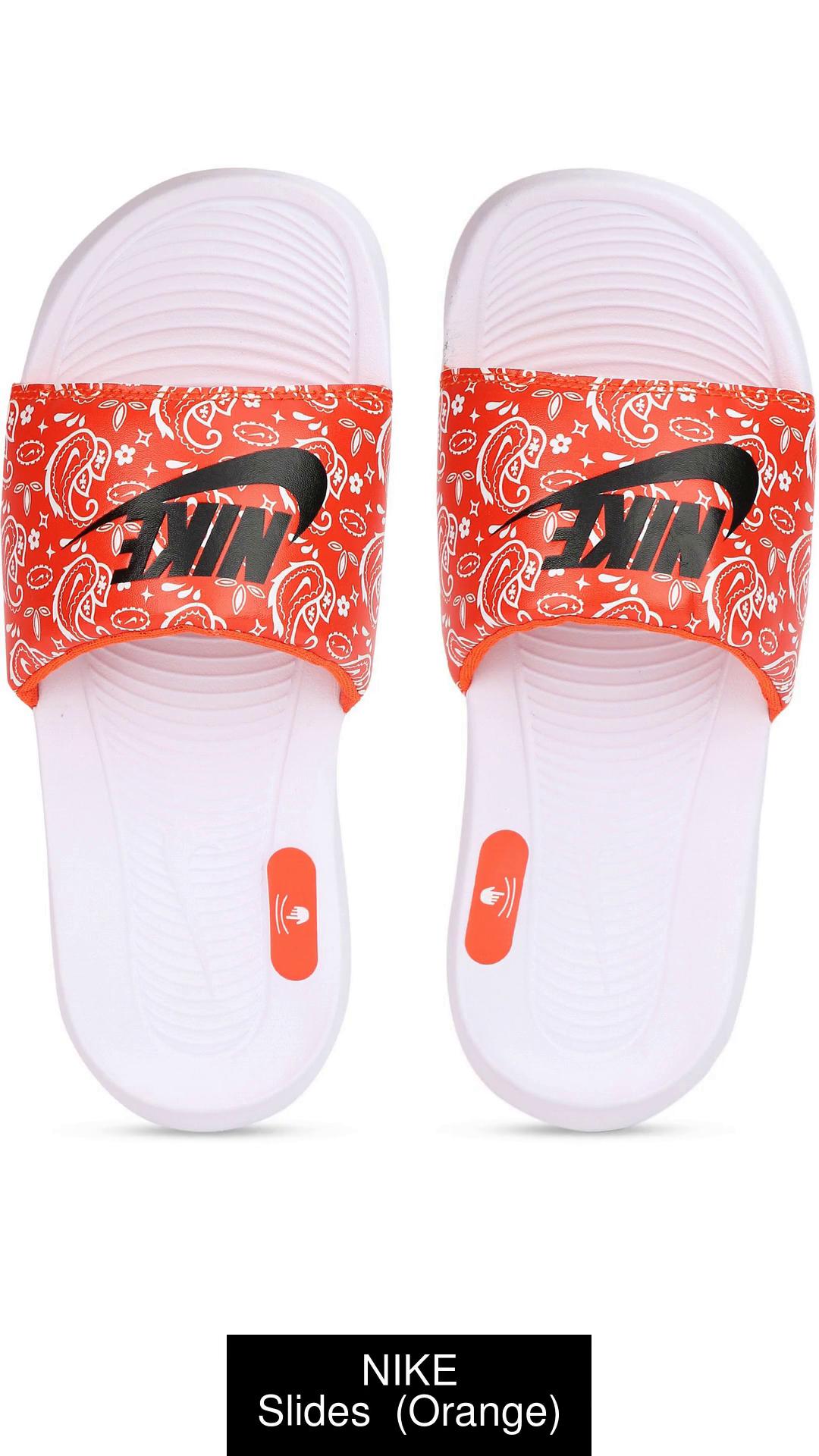 White and orange nike hot sale slides