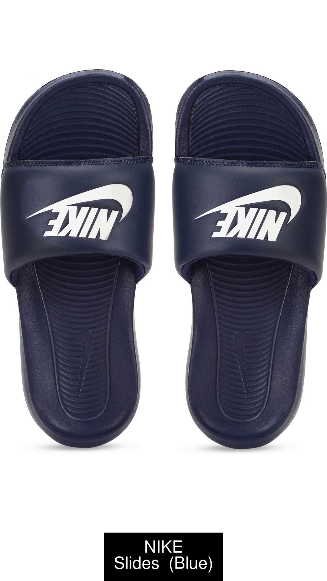 Navy blue best sale nike sliders